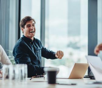 man and woman in corporate meeting 